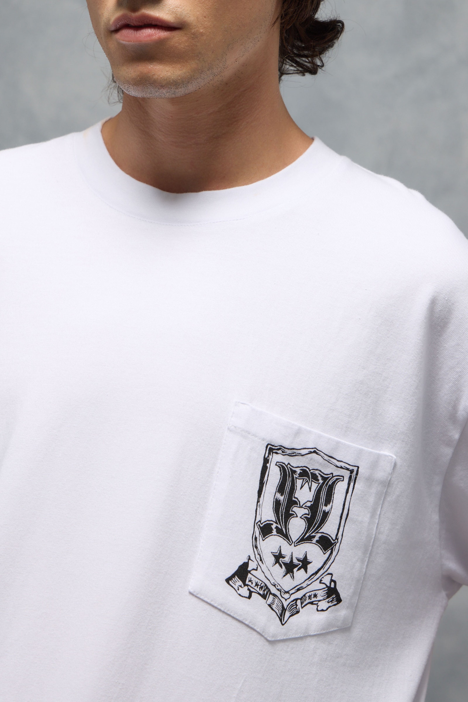REMERA KINGDOM EMBLEM                                                                                