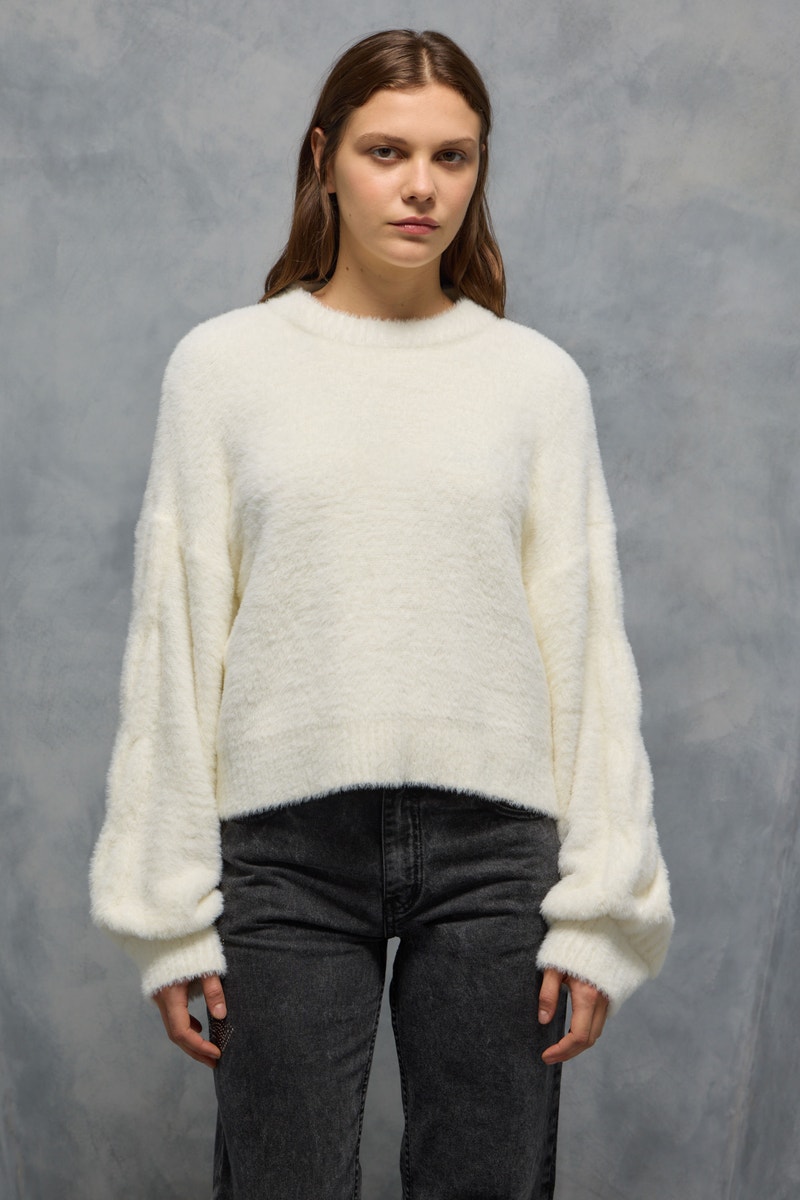 SWEATER BRAID                                                                                        